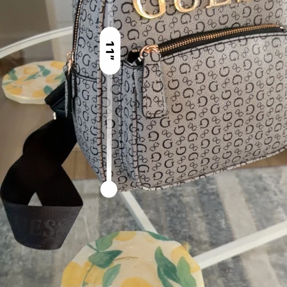 GUESS Black and Gold Patterned Backpack - Picture 2 of 7